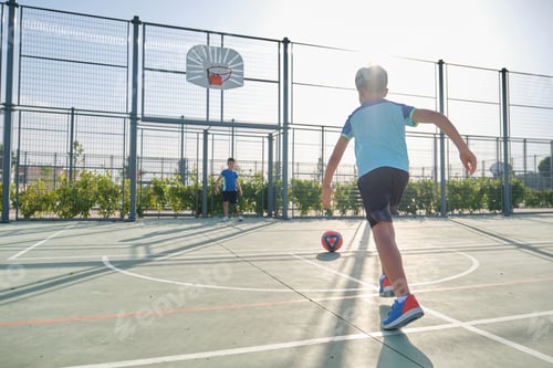 Preview: Two brothers playing football, one of them has a leg prosthesis and the other is kicking a penalty