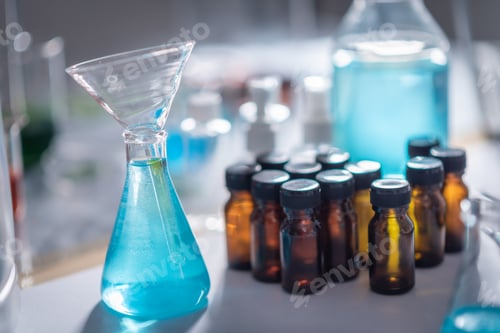 Preview: scientist with equipment and science experiments ,laboratory glassware containing chemical liquid