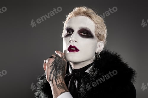 Preview: Epic Halloween costume showcasing a young handsome man with a striking look and creative disguise