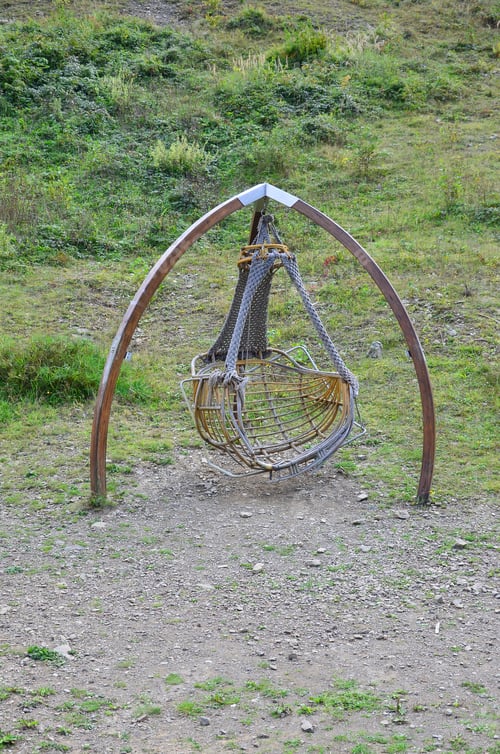 Preview: A homemade swing is located in the open air. A handmade product for entertainment and recreation