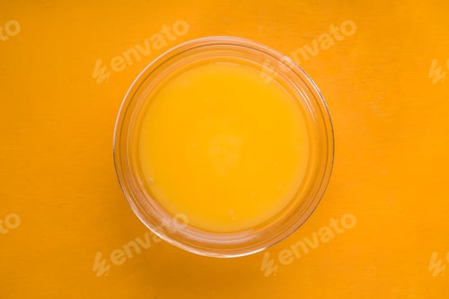 Preview: Honey on the glass bowl on the background