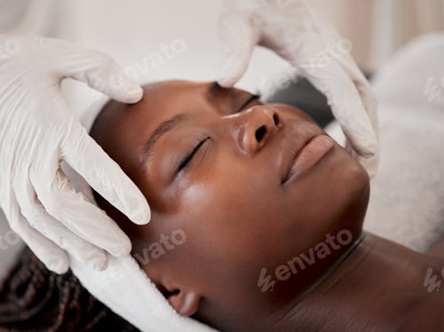 Preview: Black woman, face and sleeping in spa facial for beauty skincare, massage or relaxing in treatment.