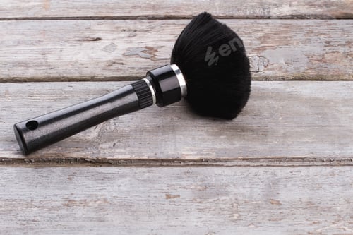 Preview: Make up brush on rustic wooden background.