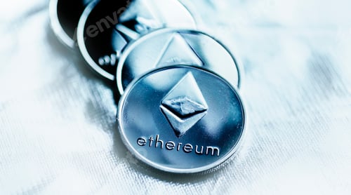 Preview: Closeup of ethereum coin cryptocurrency over silver background.
