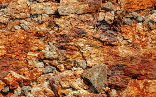 Preview: Seamless texture of golden stone. stone background template.