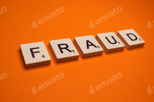 Preview: Fraud scrabble letters word on a orange background