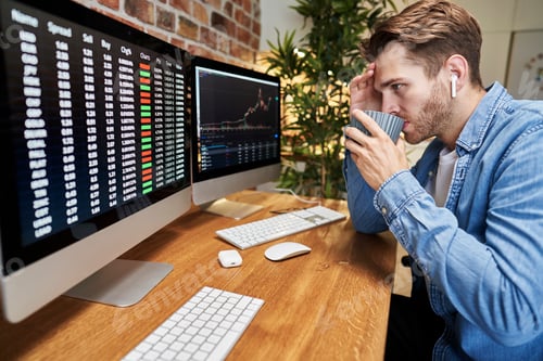 Preview: Adult man following stock market data