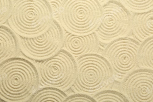 Preview: Zen rock garden. Circle patterns on beige sand, top view