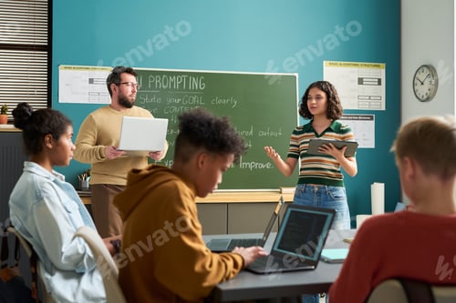 Preview: Multiethnic Group of Teenagers Collaborating during Classroom Presentation