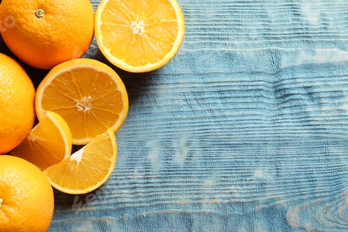 Preview: Flat lay composition with ripe oranges and space for text on wooden background