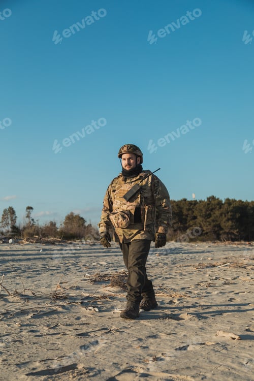 Preview: Proud Soldier Walking On The Beach On A Sunny Day