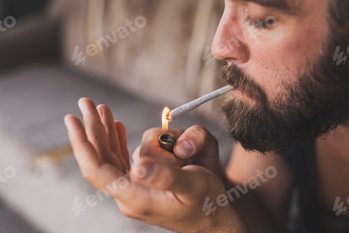 Preview: Man lighting a joint