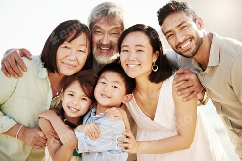 Preview: One big happy family. Cropped shot of a happy diverse multi-generational family at the beach.
