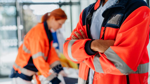 Preview: Close-up of rescuer man, his colleagues taking care of patient from an ambulance.