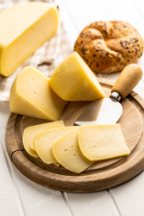 Preview: Block of hard cheese. Sliced cheese.