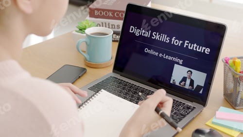 Preview: Rear view young asian woman listen watch digital class e-learning online for employee