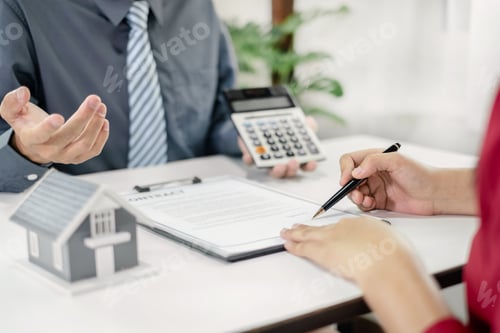 Preview: A real estate agent with a home model is talking to clients about renting a house and buying home