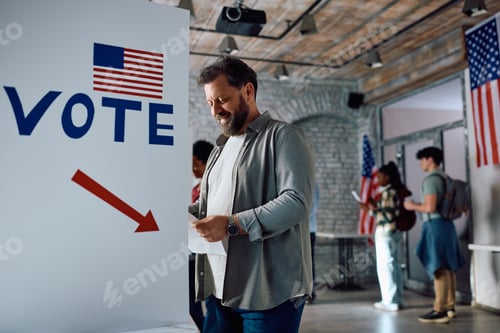 Preview: American citizen voting at polling place during US elections.