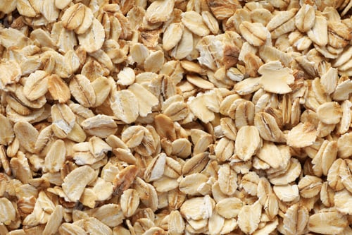 Preview: Oatmeal flakes texture on whole background, close up
