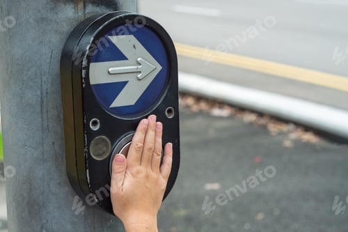 Preview: Child hand presses pedestrian crossing button with right arrow sign, asks for walk signal