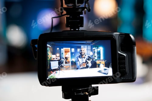 Preview: Man Recording Video in Home Studio Setup