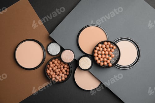 Preview: Flat lay composition with various makeup face powders on color background