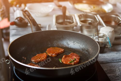 Preview: Meat with herb on pan