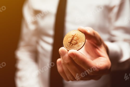Preview: Businessman offering Bitcoin cryptocurrency payment