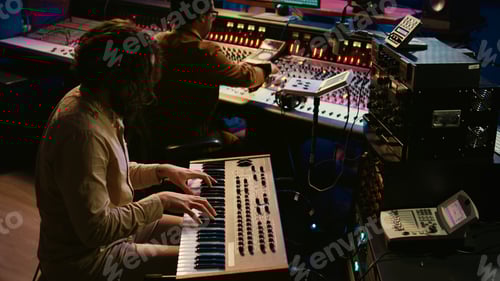 Preview: Men Working in Sound Recording Music Studio