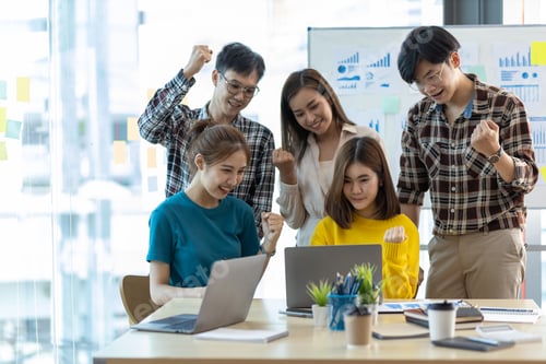 Preview: Group of young entrepreneurs who are excited and happy with the successful start of their business.