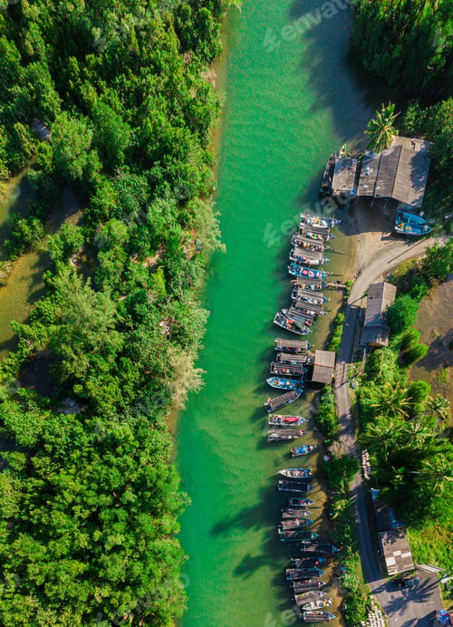 Preview: Aerial drone view of fishing boats by the riverside in Marang, Terengganu, Malaysia