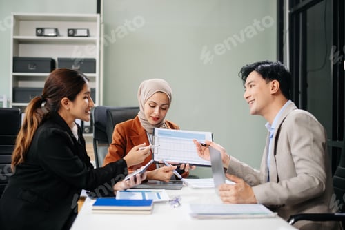 Preview: Office colleagues have a casual discussion. During a meeting in a conference room, a group
