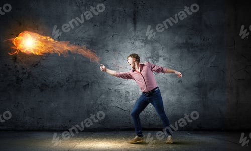 Preview: Young Man In Casual Throwing Magic Fire Balls