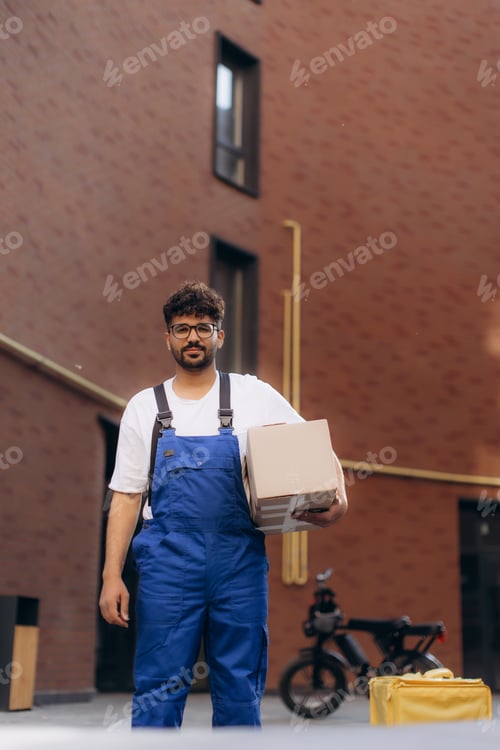 Preview: Delivery man carrying package near electric scooter in urban setting