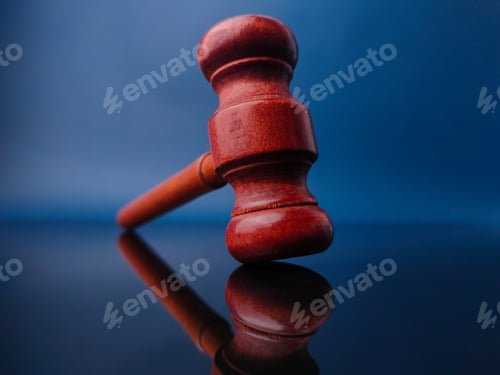 Preview: Wooden gavel with reflection on a black acrylic board