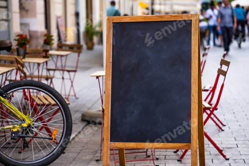 Preview: Empty easel next to cafe