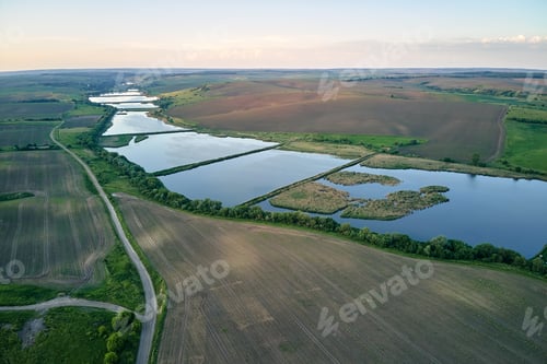 Preview: Aerial view of fish hetching pond with blue water in aquacultural area