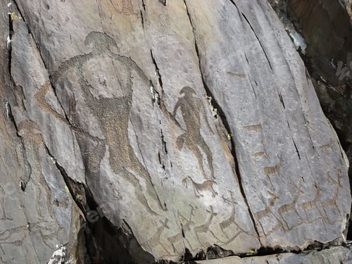Preview: Prehistorical people and animals petroglyphs carved in stones