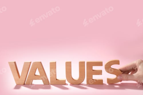 Preview: Woman making word VALUES with wooden letters on pink background, closeup