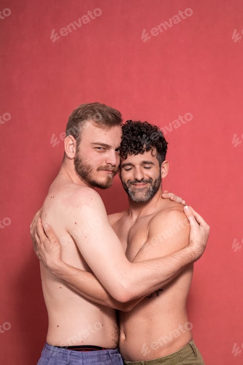 Preview: Two Men, Sexy Gay Couple, Hugging Each Other, Together In A Studio, Photo-Shoot. Eyes Closed, And