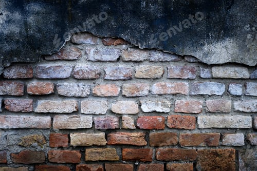 Preview: Close up of weathered orange brick wall with rough