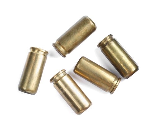 Preview: Cartridge cases isolated on white, top view. Firearm ammunition