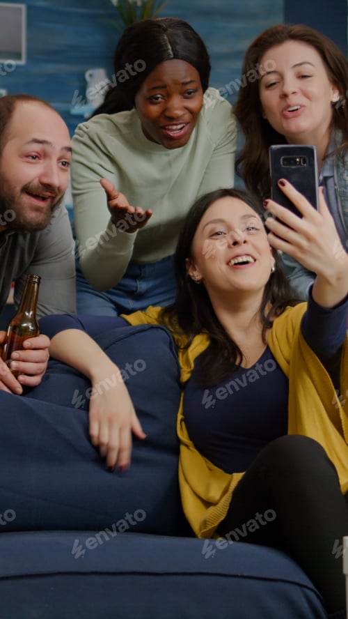 Preview: Multiracial friends speaking with collegue man during video call conference