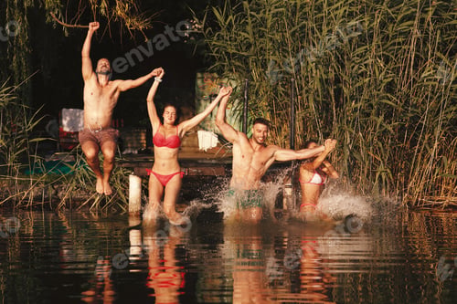 Preview: Group of young people enjoy a summer day and jump into the river