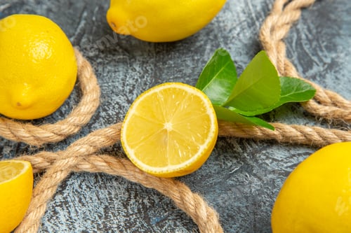 Preview: front view fresh lemons with ropes on light-dark background citrus fruit photo