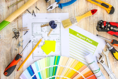 Preview: Paint palette house plan and repair tools. Selective focus.