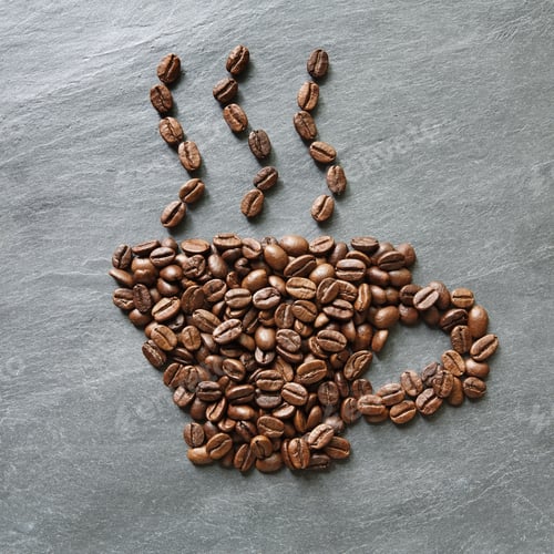 Preview: Cup from coffee beans at stone background