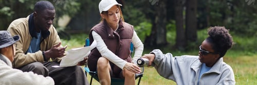 Preview: Header Image of Friends Camping in Nature