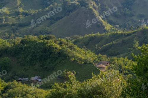 Preview: school and houses in a rural area among the beautiful mountains located in the village of Ginebra