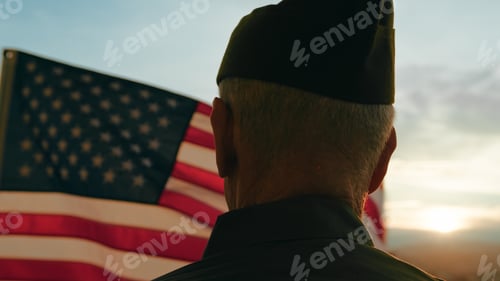 Preview: Elderly Man Stand Against American Flag For Veterans Day Holiday